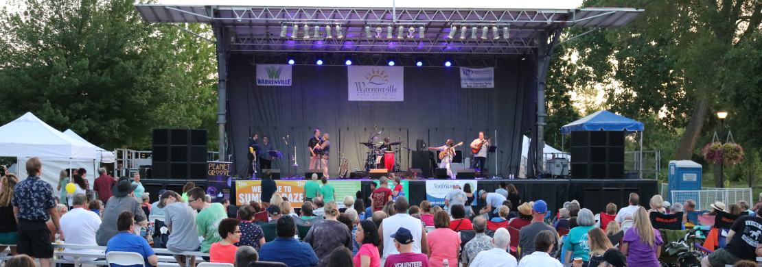 Stage with musicians performing at concert